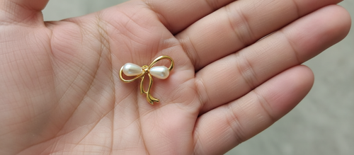 Floral pearl crystal drop earrings .